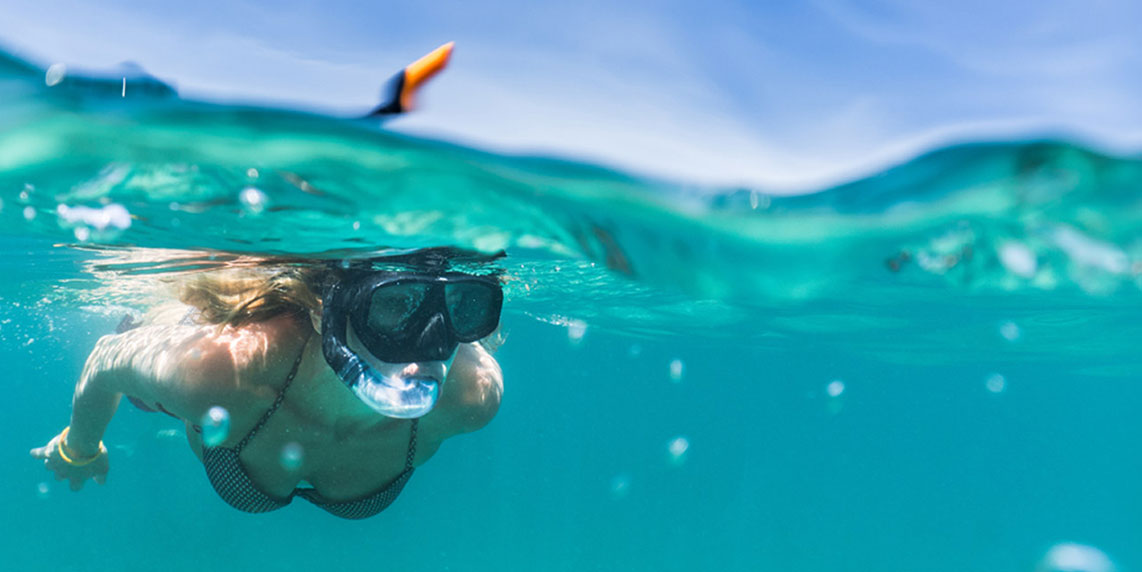 girl snorkeling